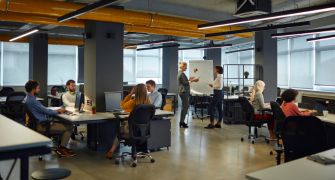 Freelancers and startup teams working together in a coworking space